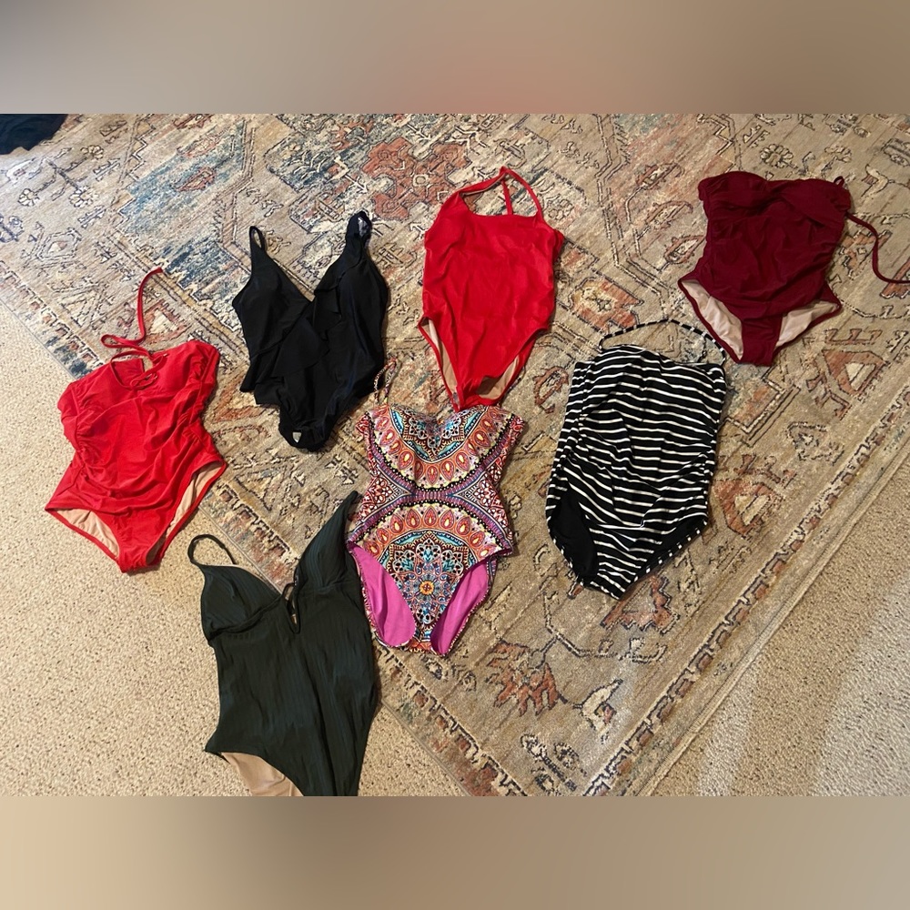 7 brand new never worn suits!